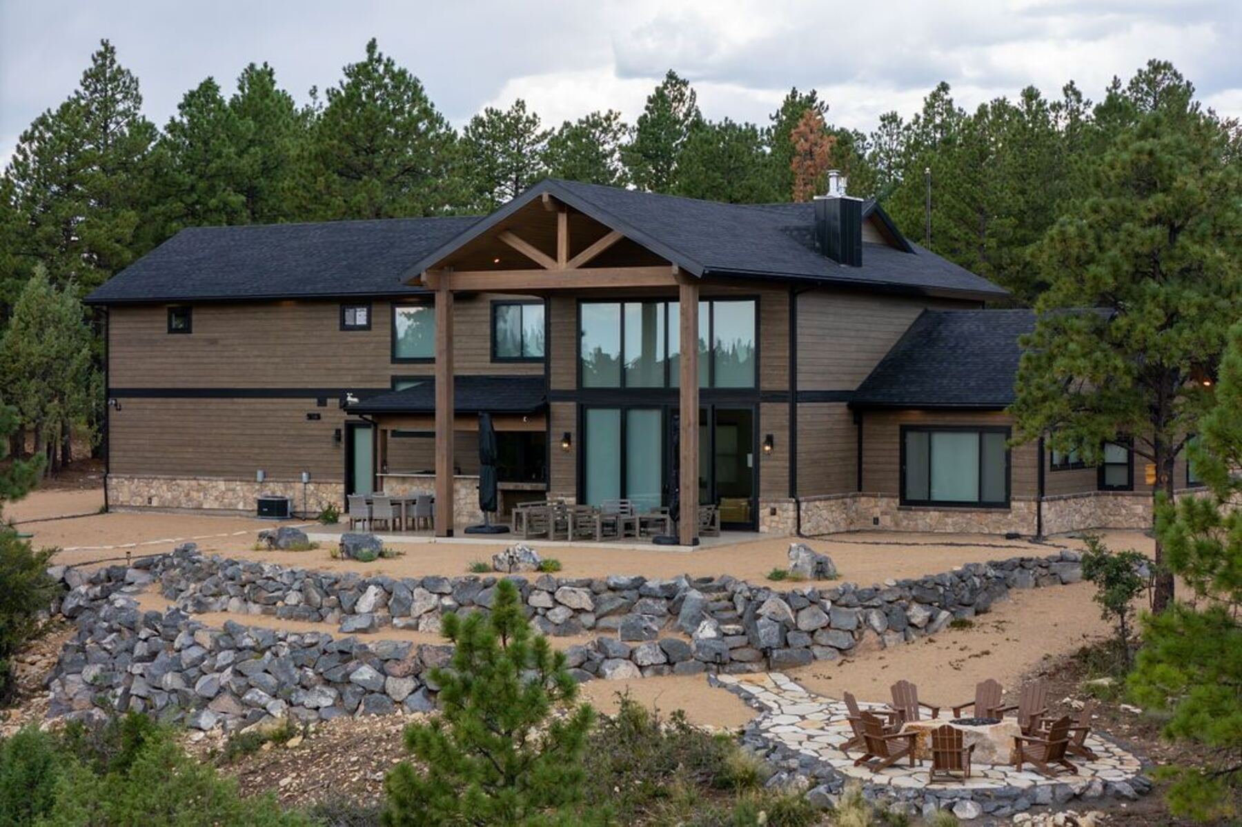 Rear elevation and fire pit of a Jacobs Construction lodge