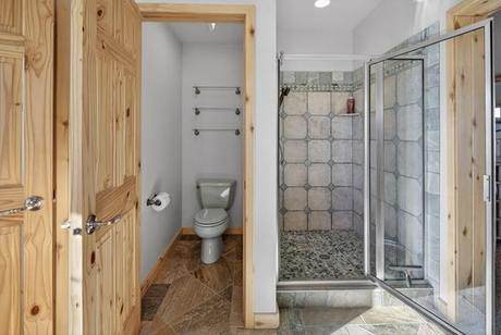 Tiled shower on the lower level