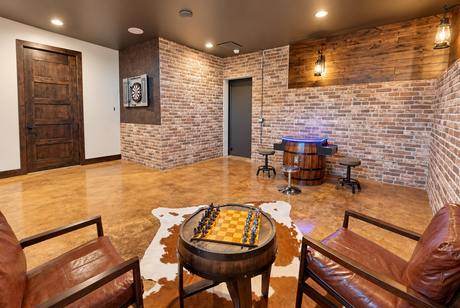 Brick, lantern light, a game room